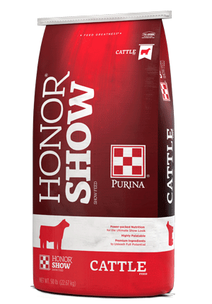 Image of red and white cattle show feed bag left facing