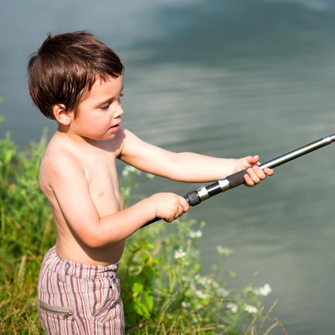 image of a boy with a fishing pole