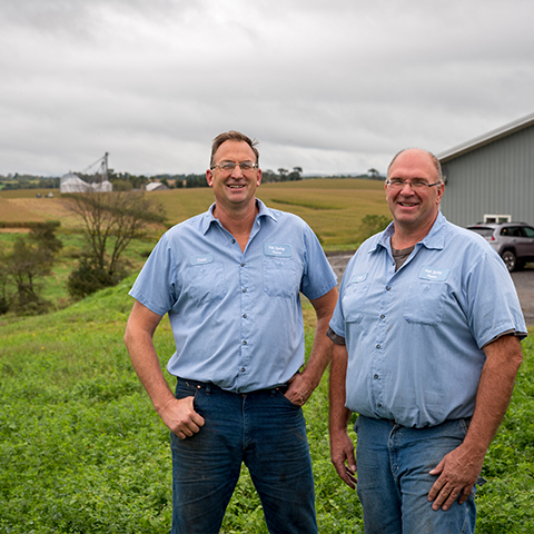 Dairy farmers Scott and Steve Wolfe stand outside Oak Spring Farms in Centre Hall, Pennsylvania. 